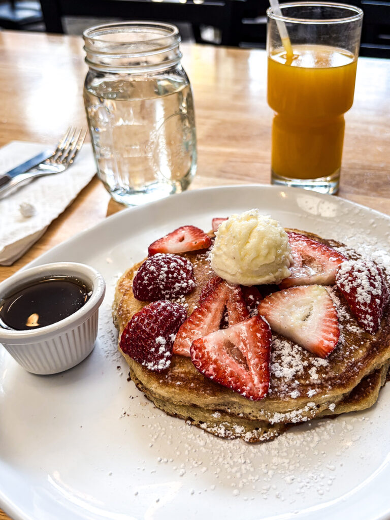 Strawberry Short Stack with fresh squeezed orange juice at Cracked and Battered, Marina District, San Francisco CA